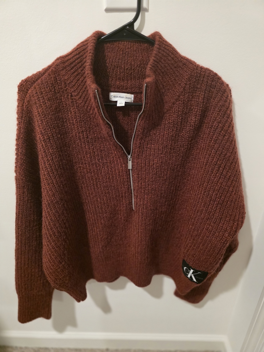 Calvin Klein Jeans half-zip mock sweater.